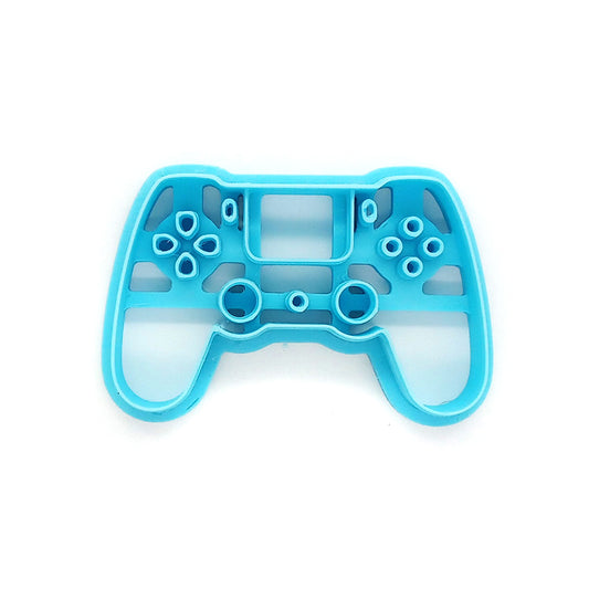 Blue gaming controller clay cutter on a white background