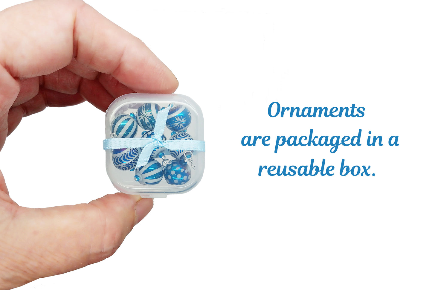 Tiny box for miniature ornaments, tied with light blue ribbon