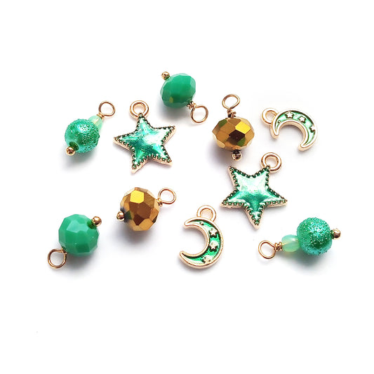 Green aqua moons, stars, and glass bead dangle charms.
