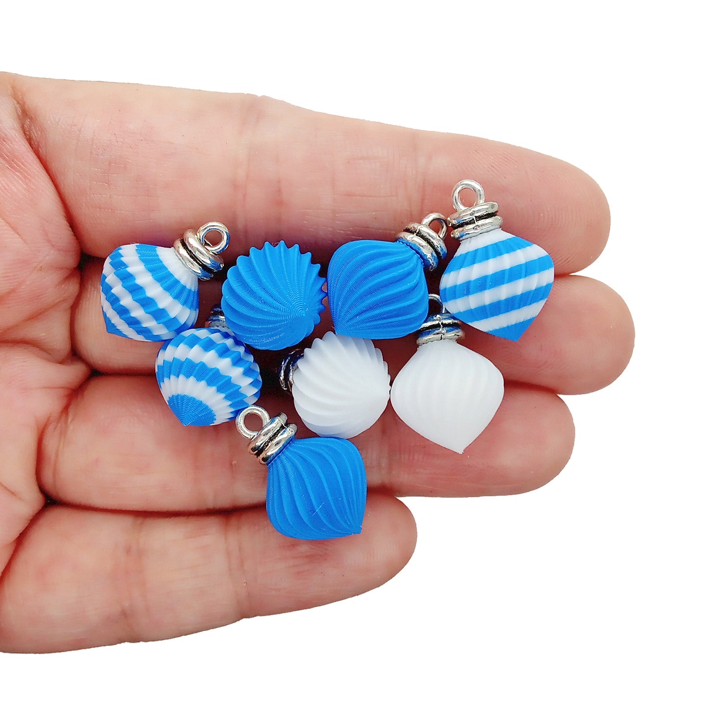 Miniature Christmas ornaments in white, blue and a blue and white striped pattern. Made by Adorabilities and Teeny Tiny Christmas.