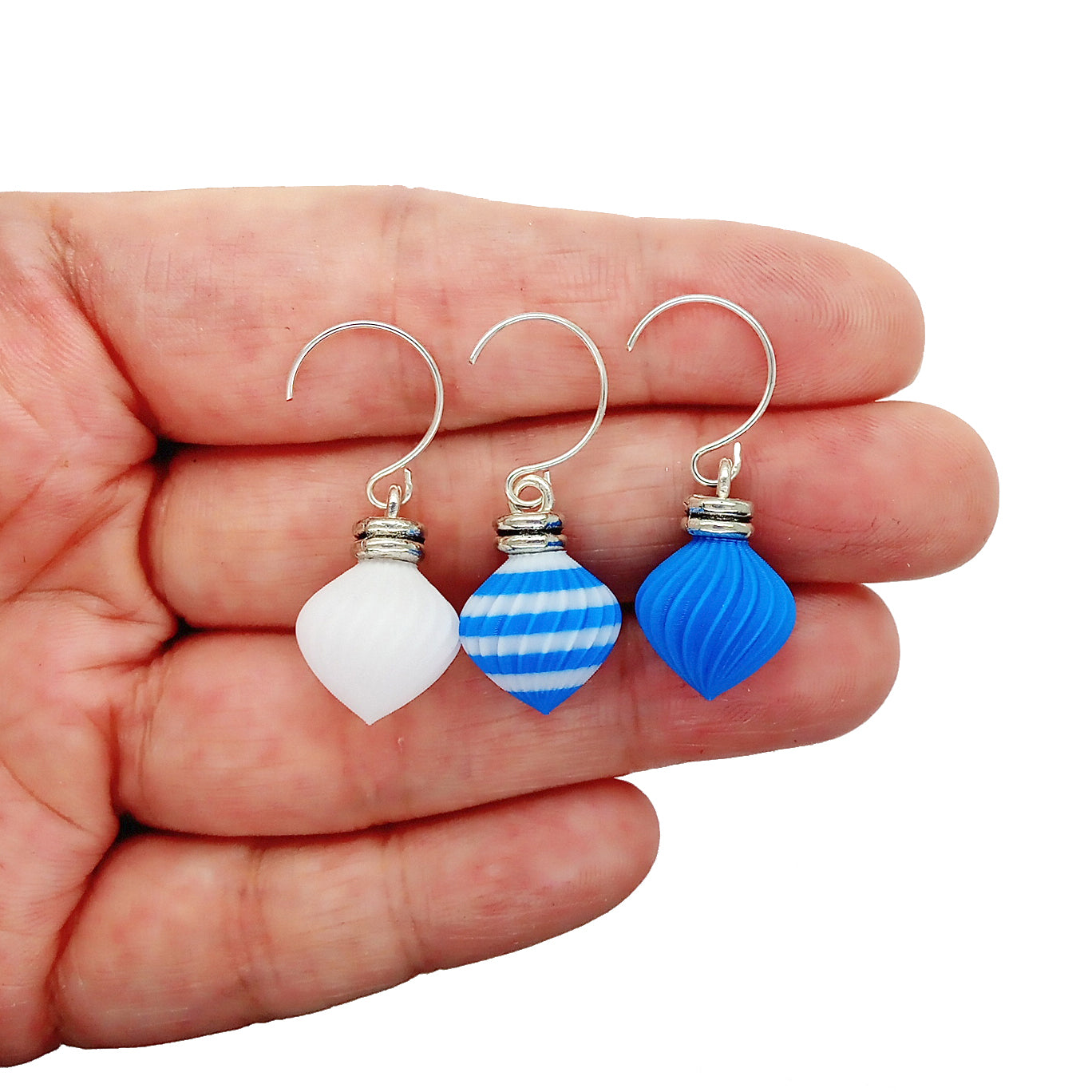 Miniature Christmas ornaments with hooks/hangers in white, blue and a blue and white striped pattern. Made by Adorabilities and Teeny Tiny Christmas.