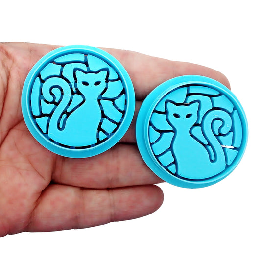 Cat polymer clay cutters in stained glass mosaic pattern.