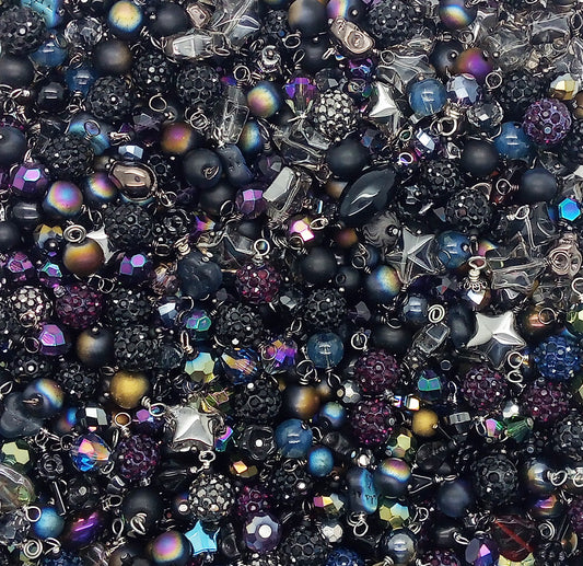 Black purple blue and red bead dangle charms for gothic jewelry or witchcore accessories.