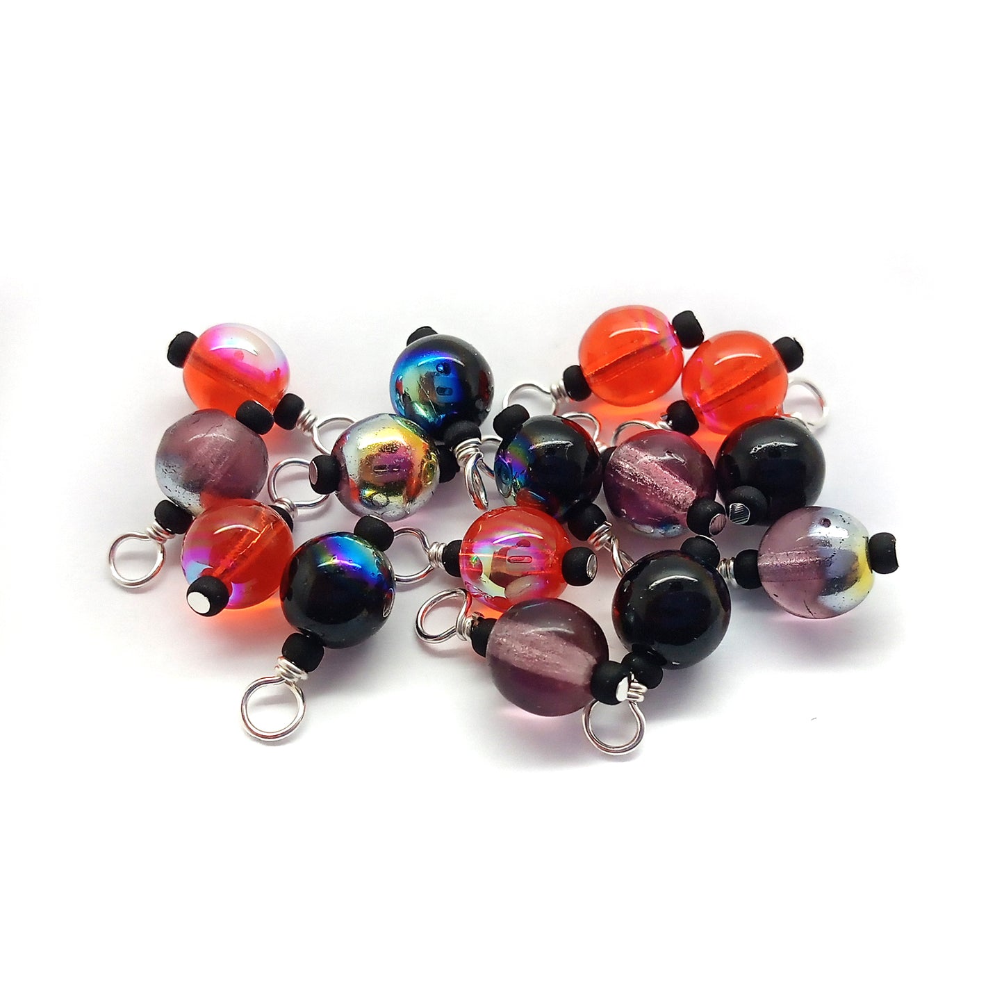Glass Bead charm dangles in Halloween colors: black, orange and purple.