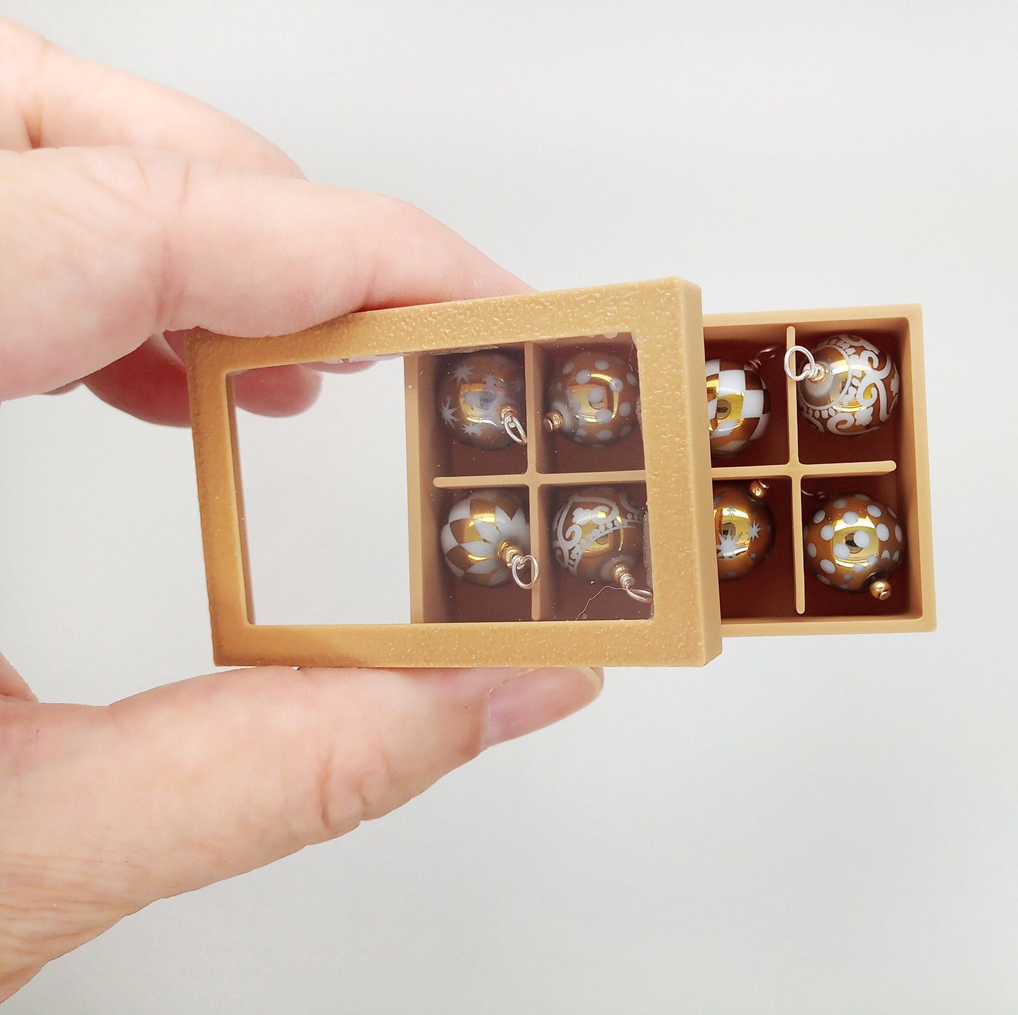 Gold Miniature Christmas Ornaments in Storage Box