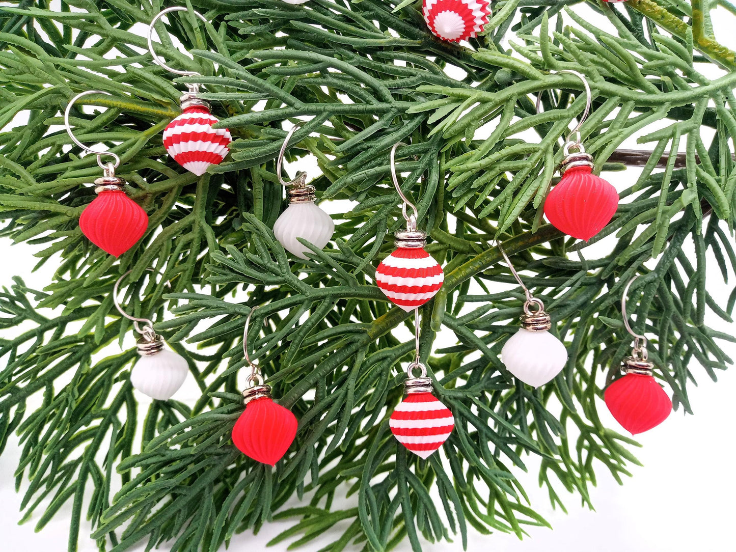 Miniature Christmas ornaments with hooks/hangers in white, red and a red and white striped pattern. Made by Adorabilities and Teeny Tiny Christmas.