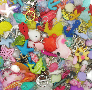 Ocean, sea, fish, and shell charms.