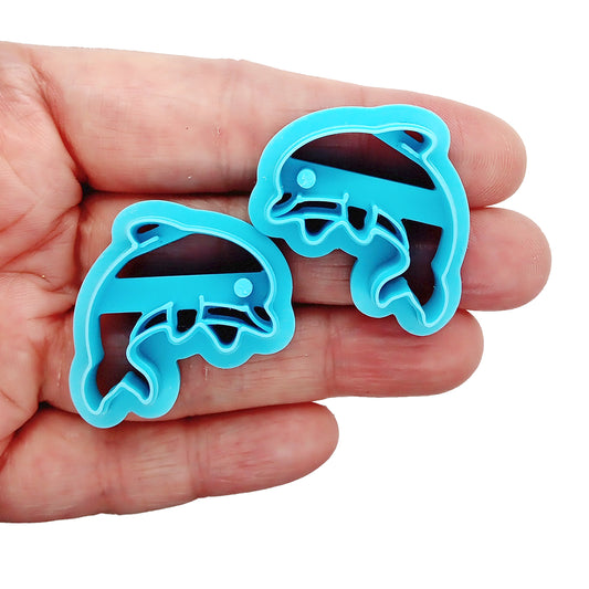 2 mirrored dolphin clay cutters
