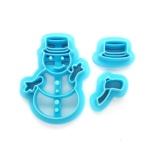 Set of blue snowman-themed clay cutters on a white background