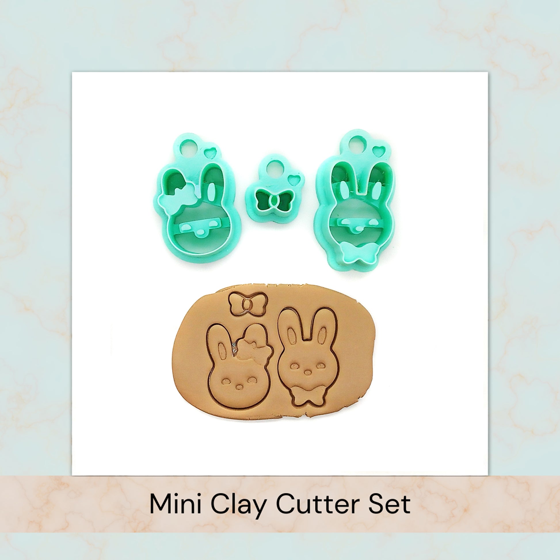 Mini clay cutter set with bunny and bow designs on a light blue background