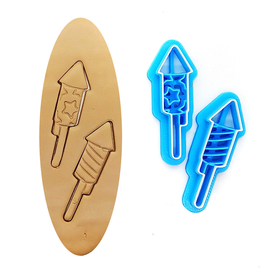 Clay cutter set with two blue fireworks cutters on a white background