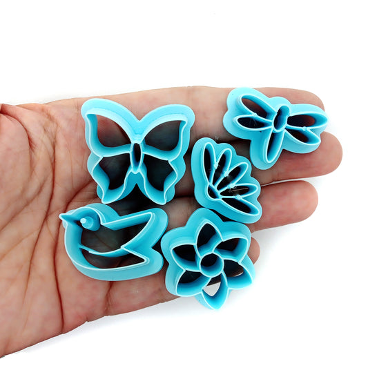 Spring themed polymer clay cutters: butterfly, dragonfly, bird and flowers