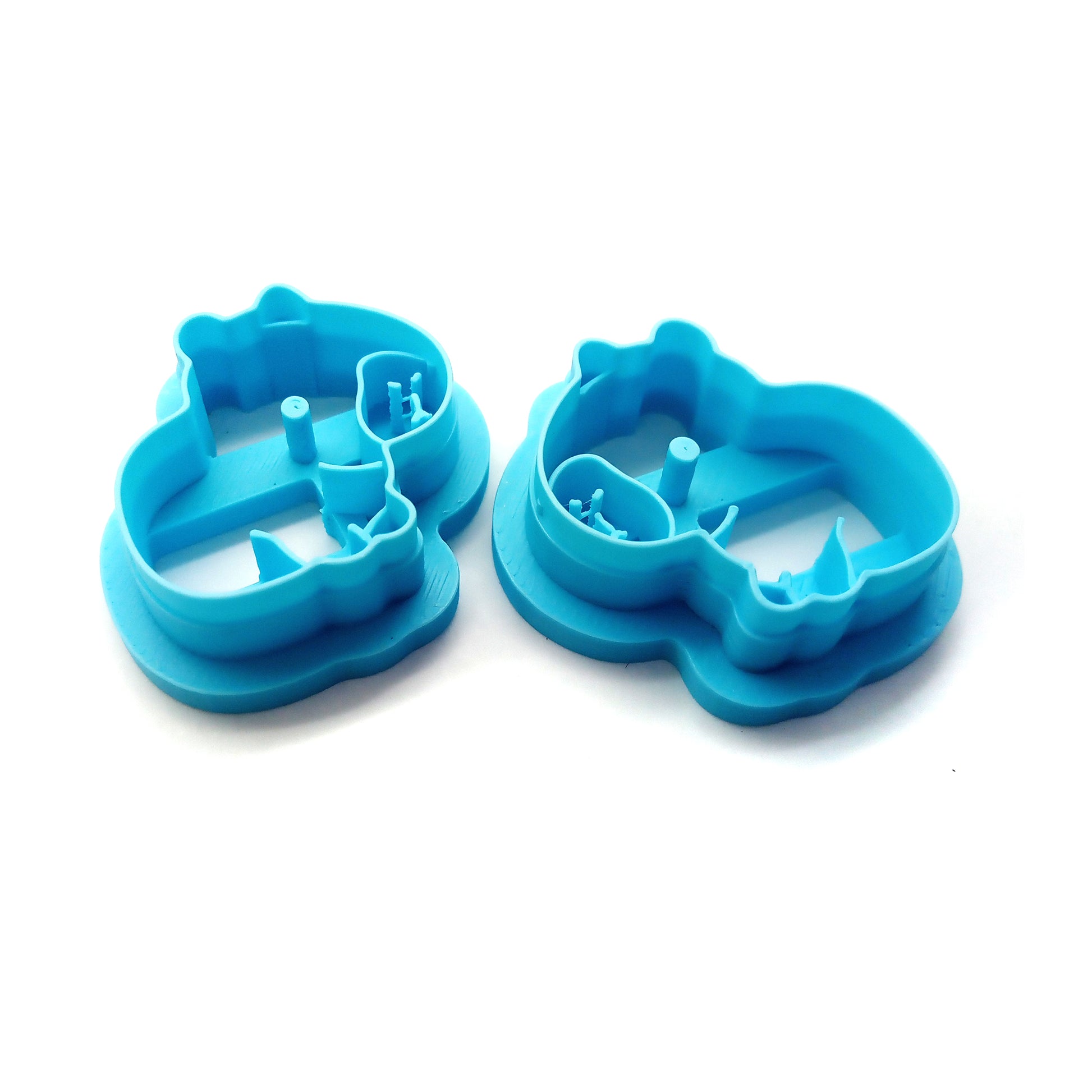 Two cabybara clay cutters on a white background