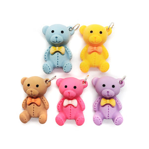Cute teddy bear charms, made from resin flatback cabochons, in pink, purple, brown, blue and yellow.