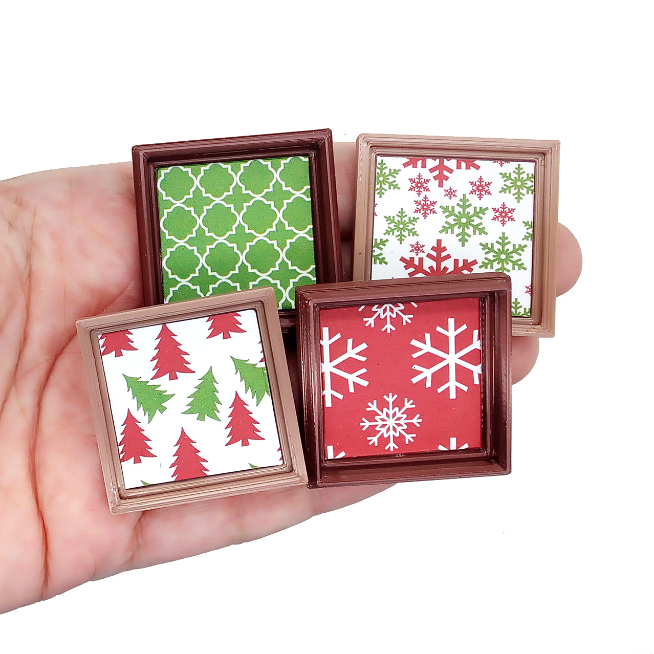 Fo framed Christmas prints for small dollhouses, including snowflakes, plaid, reindeer, polka dots and Christmas trees.r