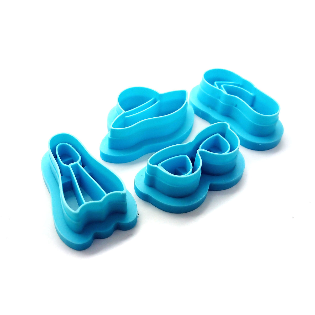 Summer vacation or beach clay cutter set: flipper, flip flop, sun hat and sunglasses.