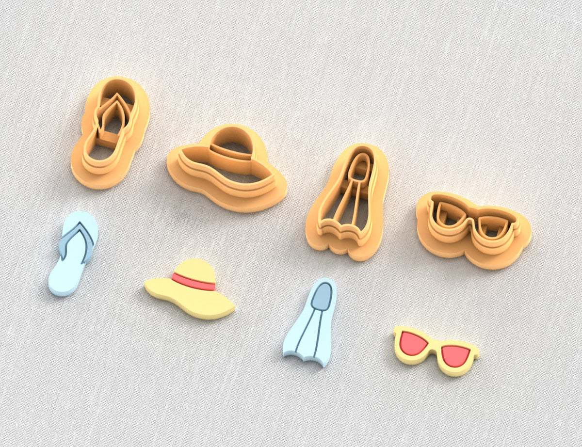 Summer vacation or beach clay cutter set: flipper, flip flop, sun hat and sunglasses.