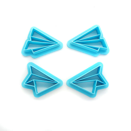Paper airplane polymer clay cutters.