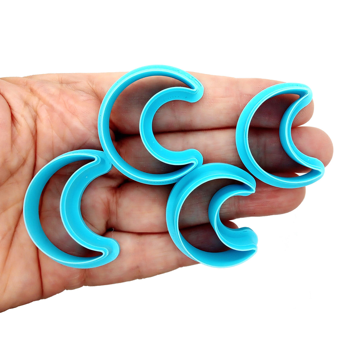 Polymer clay cutters in moon shapes