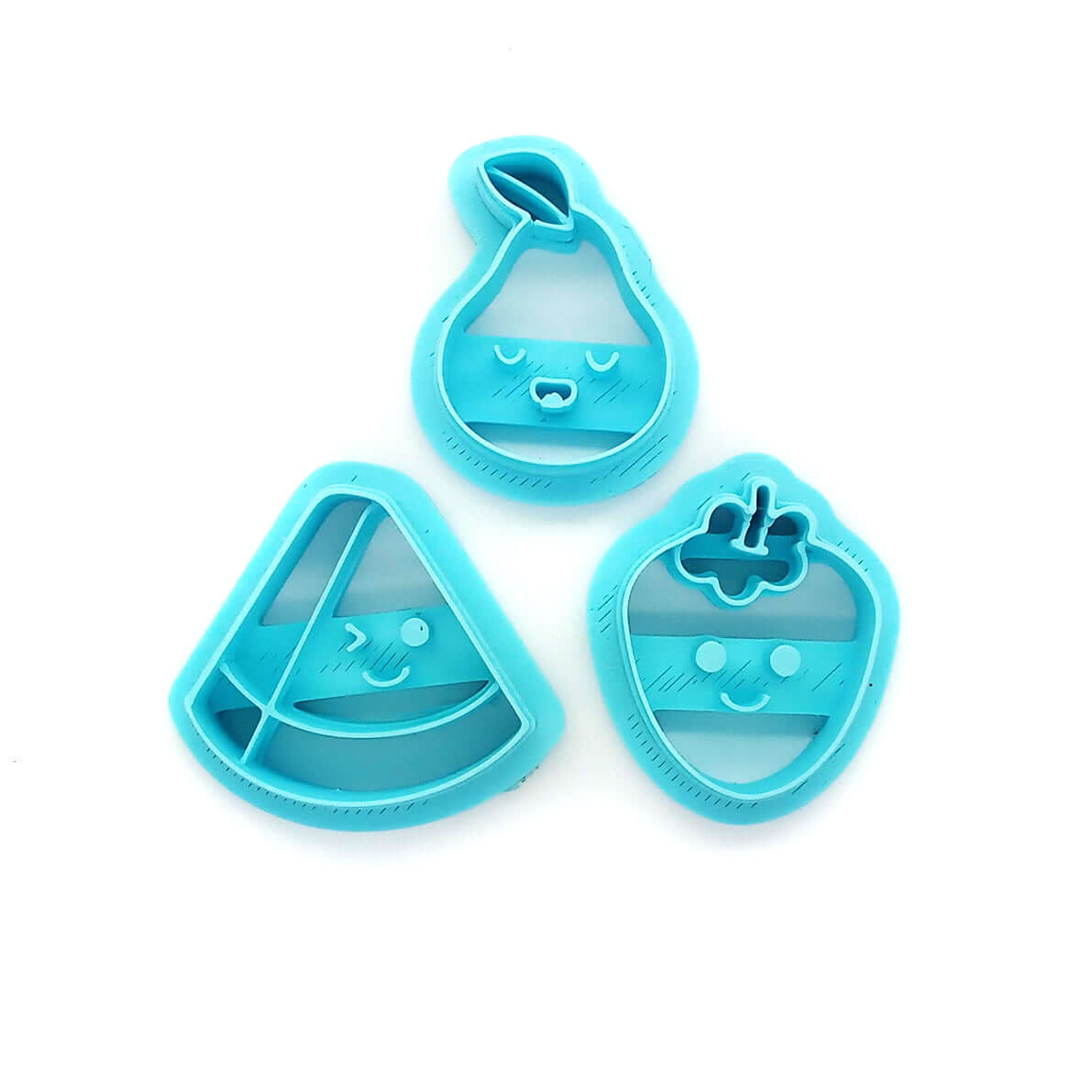 Cute fruit clay cutters: kawaii watermelon, pear and strawberry.