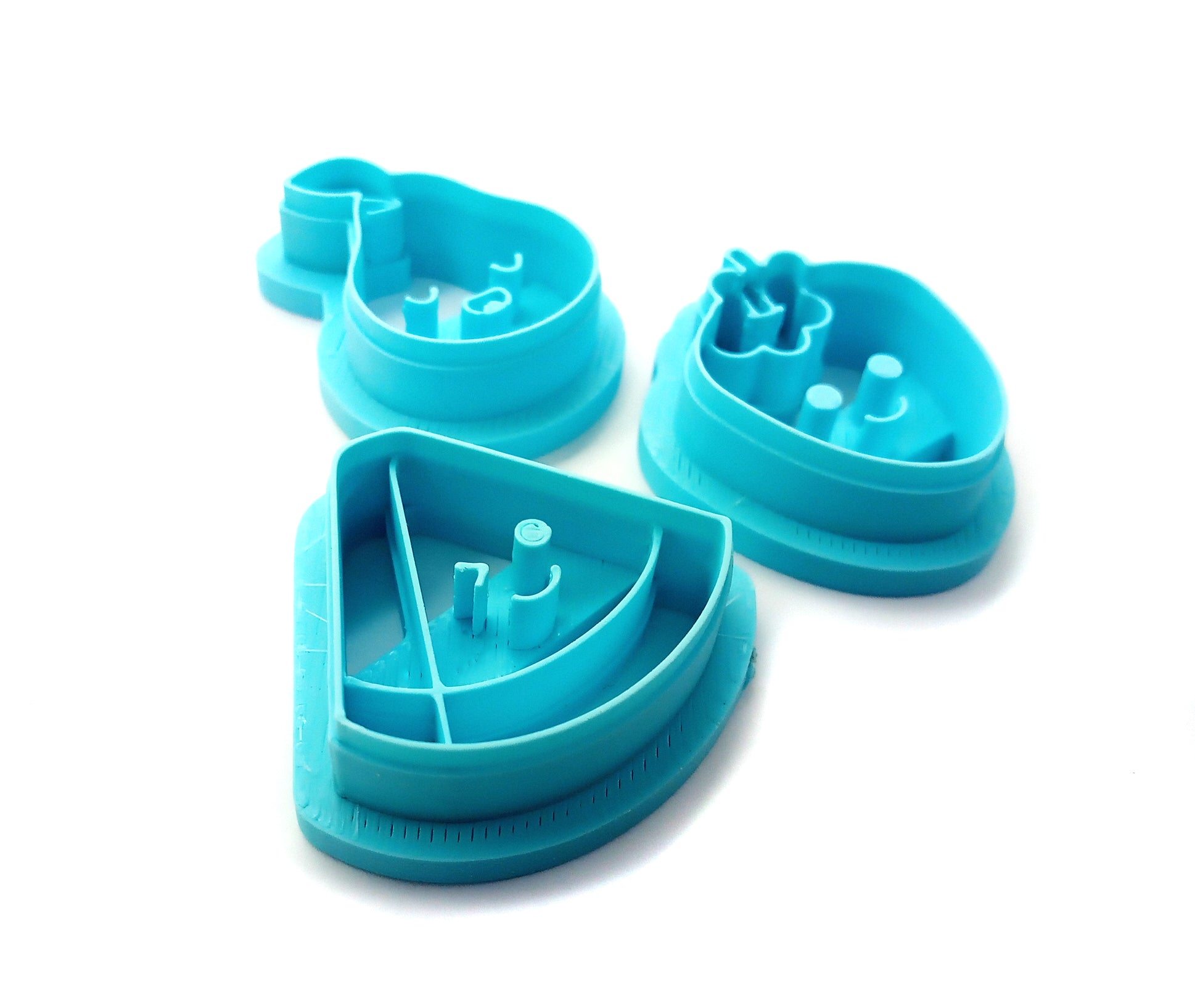 Cute fruit clay cutters: kawaii watermelon, pear and strawberry.