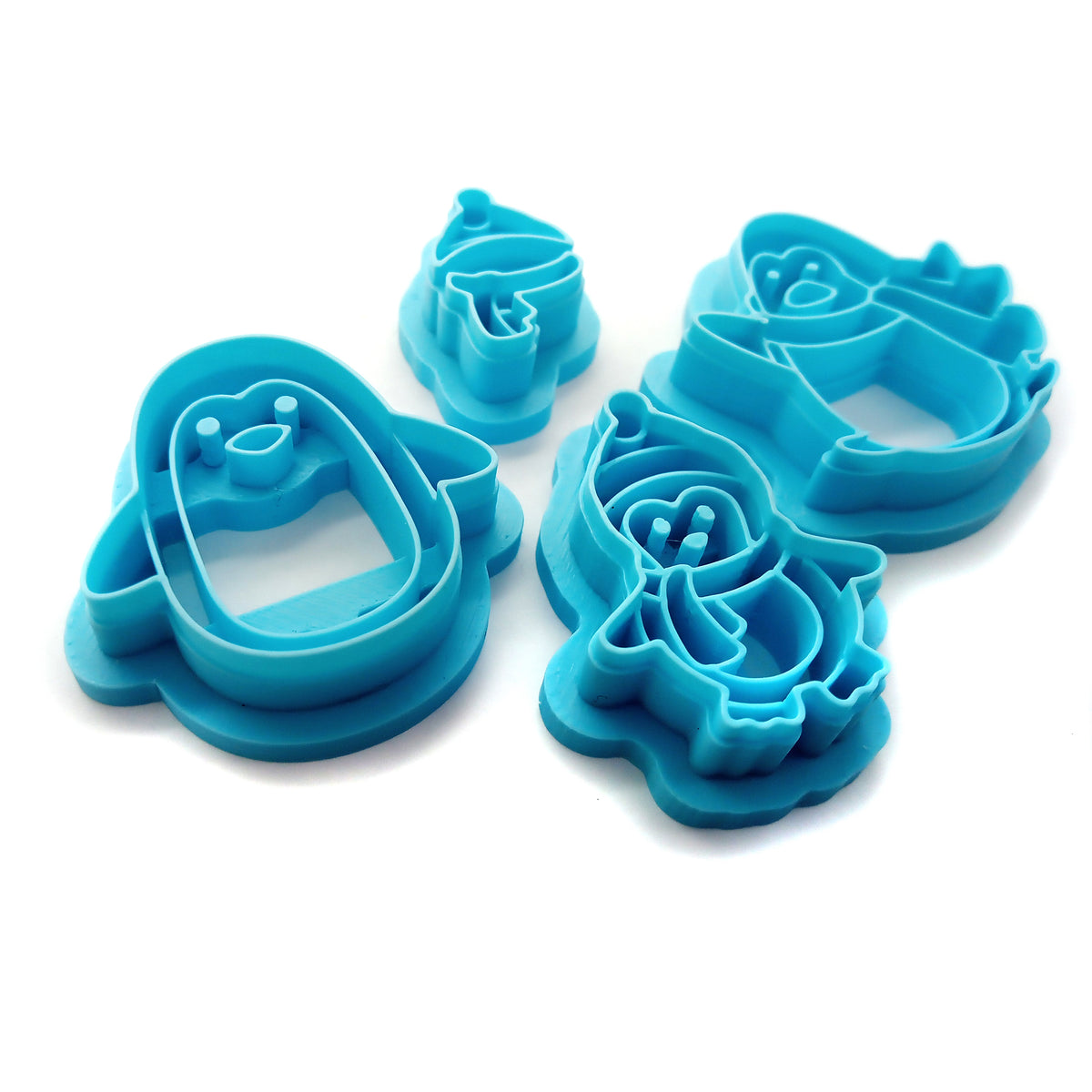 Winter penguin polymer clay cutters set.