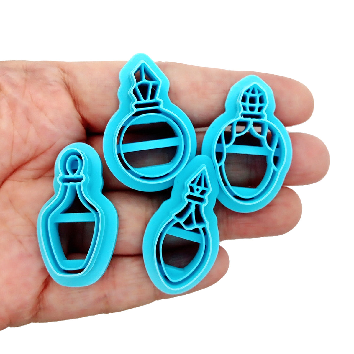 Small potion or perfume bottle polymer clay cutter set.