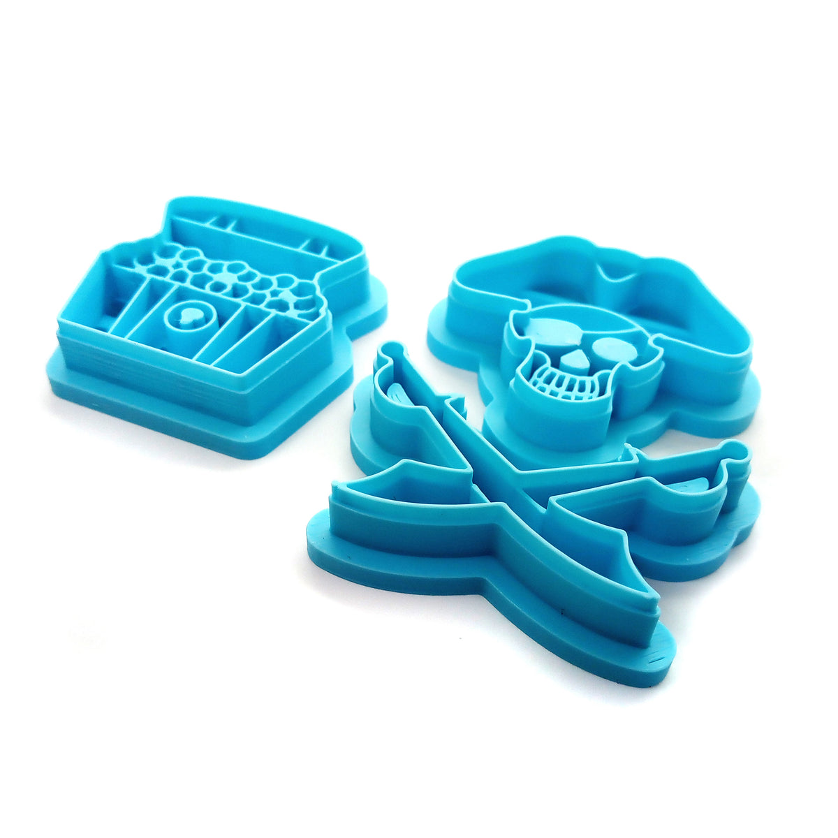 Pirate skull, sword, and treasure chest polymer clay cutter set.