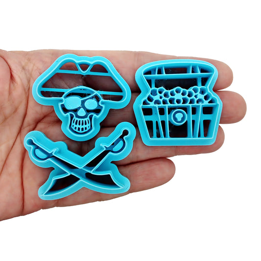 Pirate skull, sword, and treasure chest polymer clay cutter set.