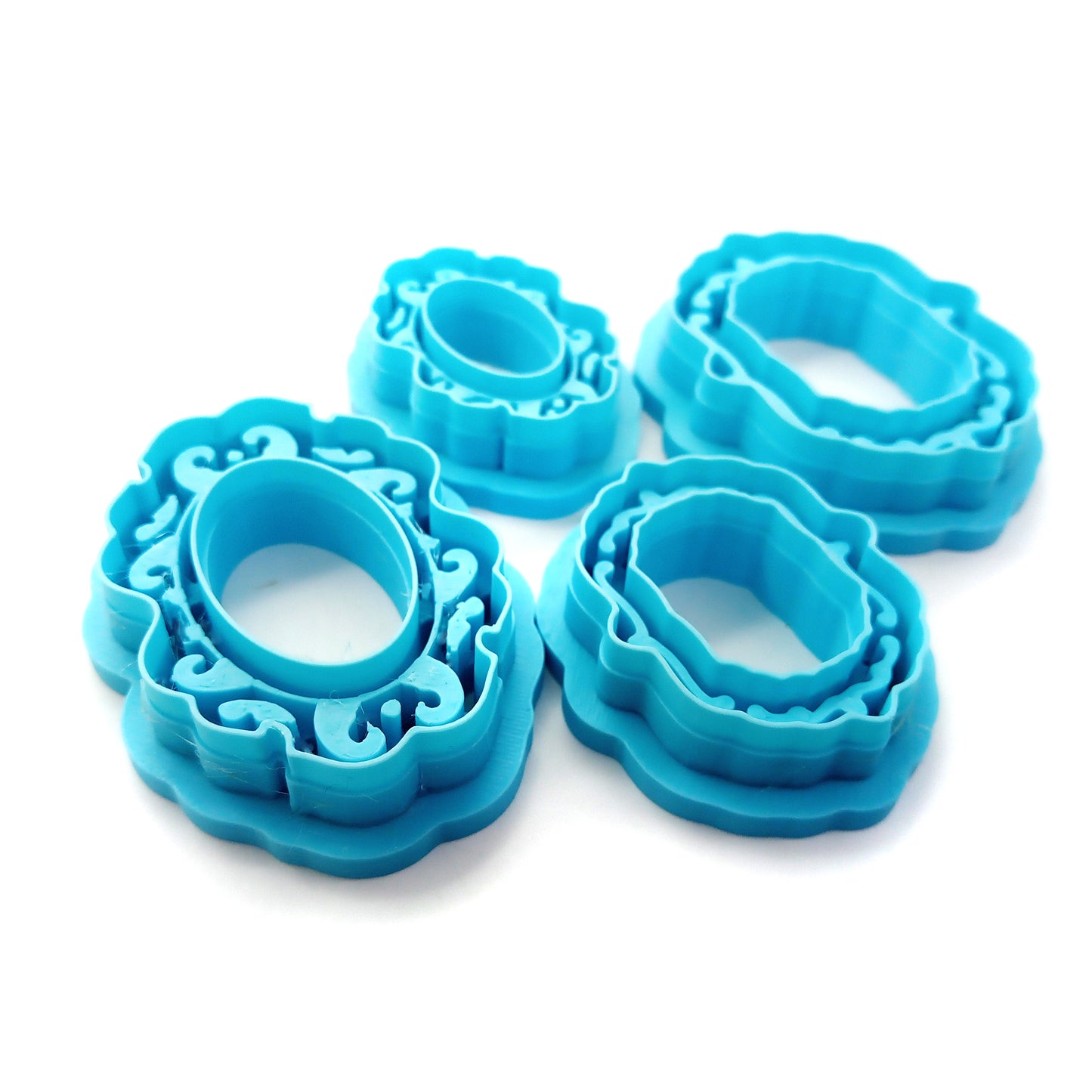 Ornate Frame clay cutters on a white background.