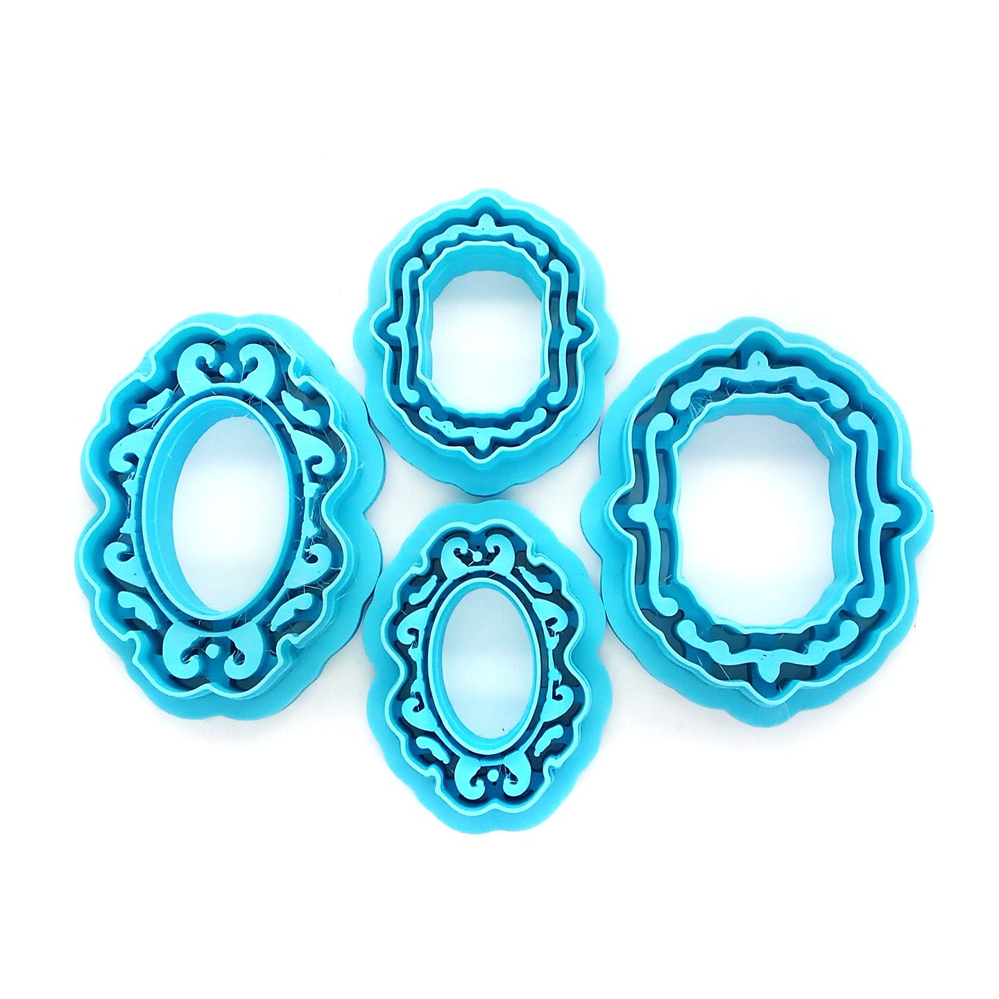 Fancy Frame clay cutters on a white background.