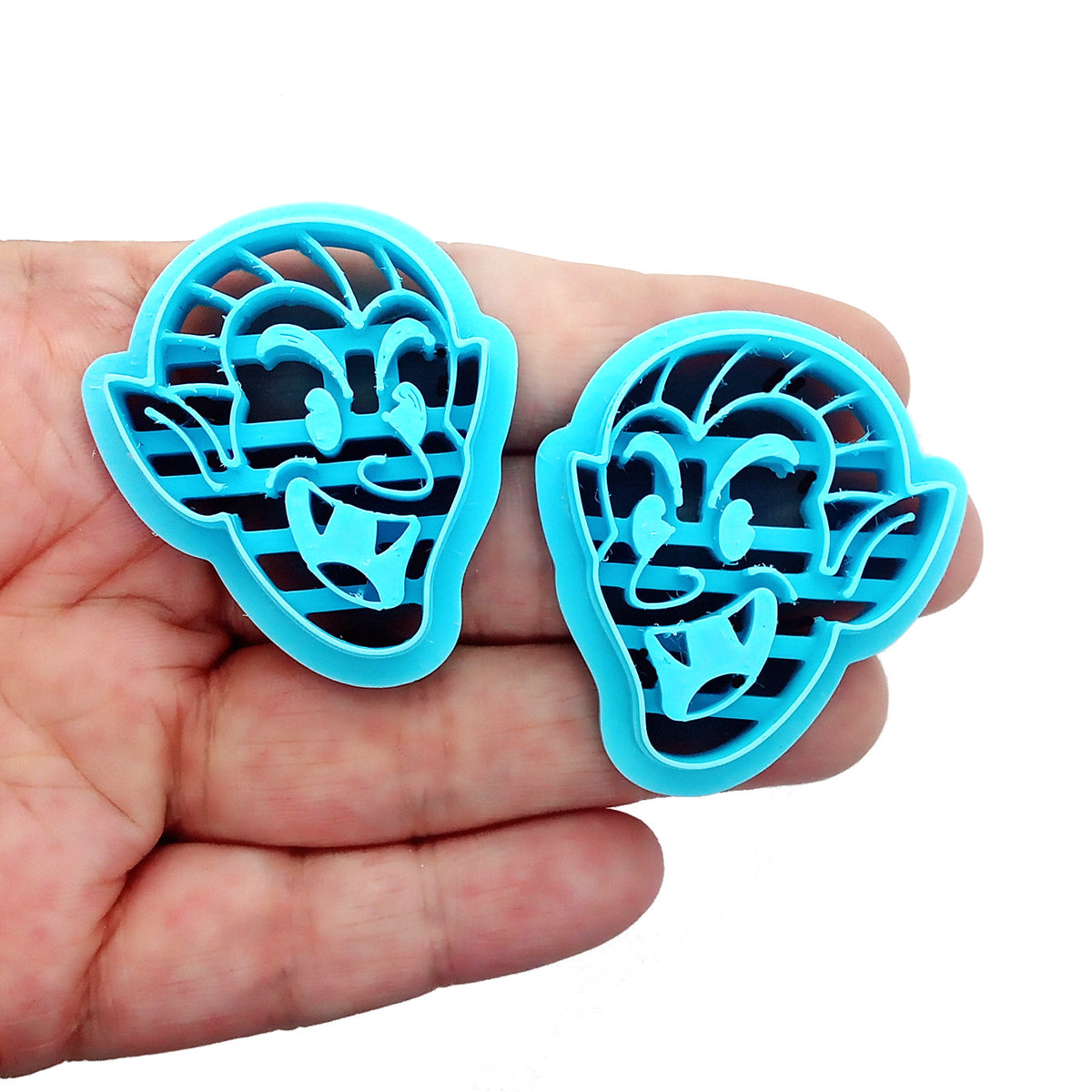 Laughing vampire polymer clay cutters.
