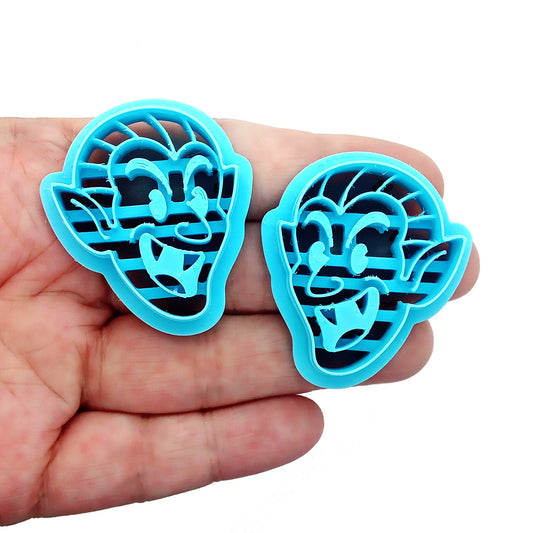 Laughing vampire polymer clay cutters.