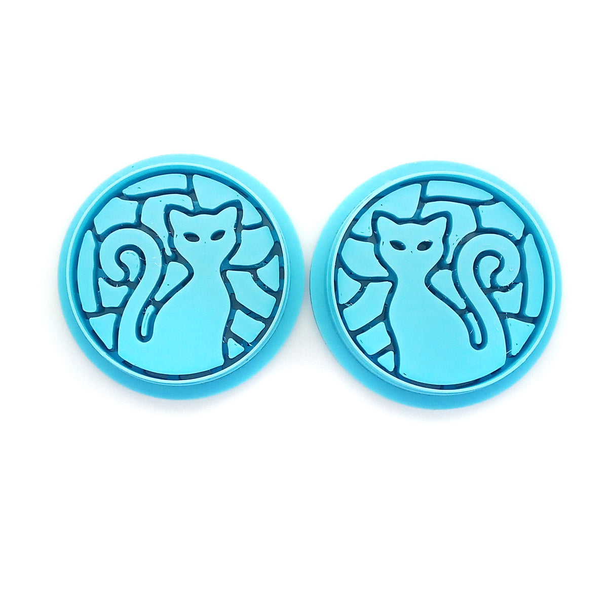 Cat polymer clay cutters in stained glass mosaic pattern.