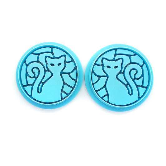 Cat polymer clay cutters in stained glass mosaic pattern.