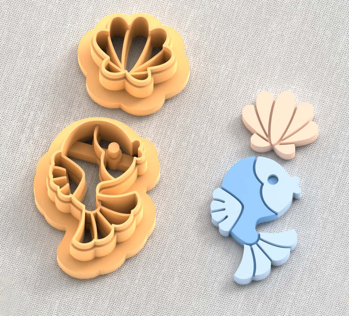 Cute fish and seashell polymer clay cutters.