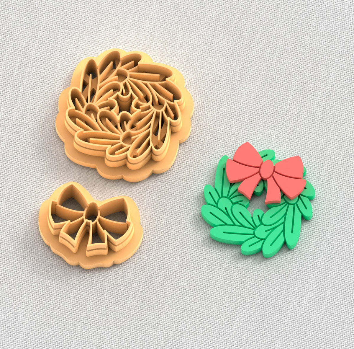 Holiday wreath with bow polymer clay cutter set.
