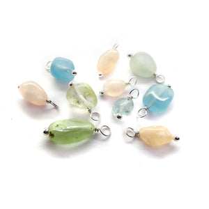 Beryl bead dangle charms in pastel pink, yellow, blue and green made from gemstone beads.