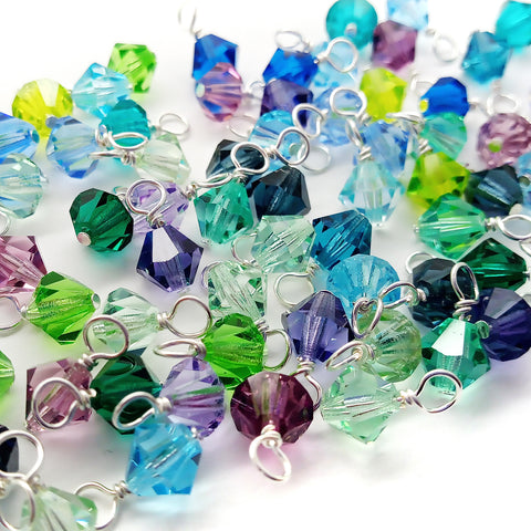 6mm bicone bead dangle charms in Czech glass. Mix of blues, aquas, turquoise, greens, and purples.