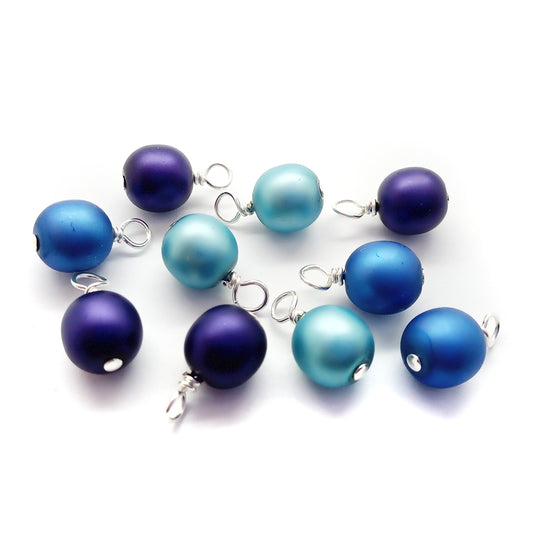 Blue, purple, and aqua glass bead charm dangles.