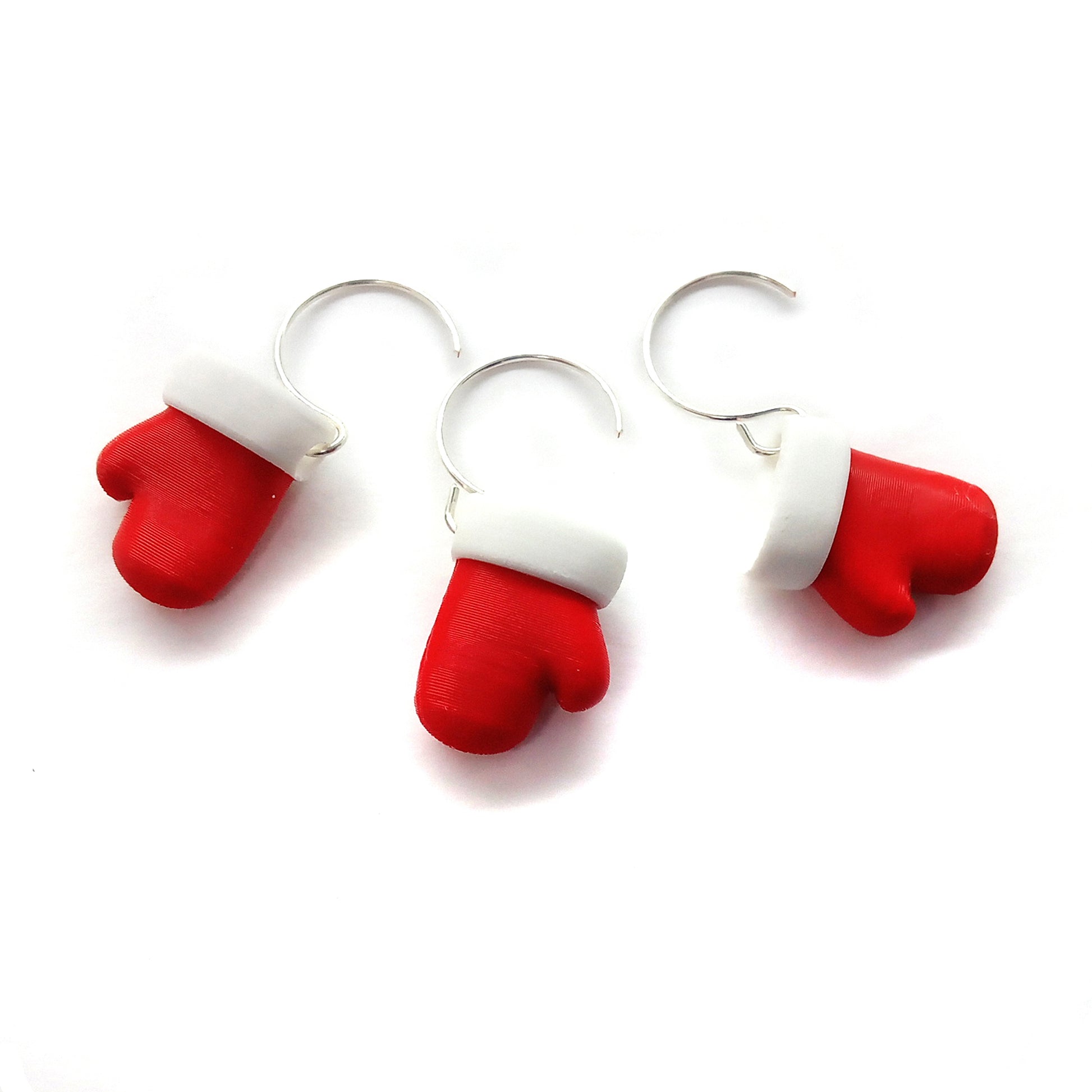 Cute red and white mitten ornaments for dollhouse or miniature Christmas trees.