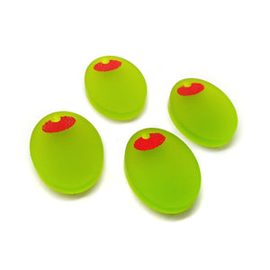 Small olive charms cut from acrylic, green with pimento accents.