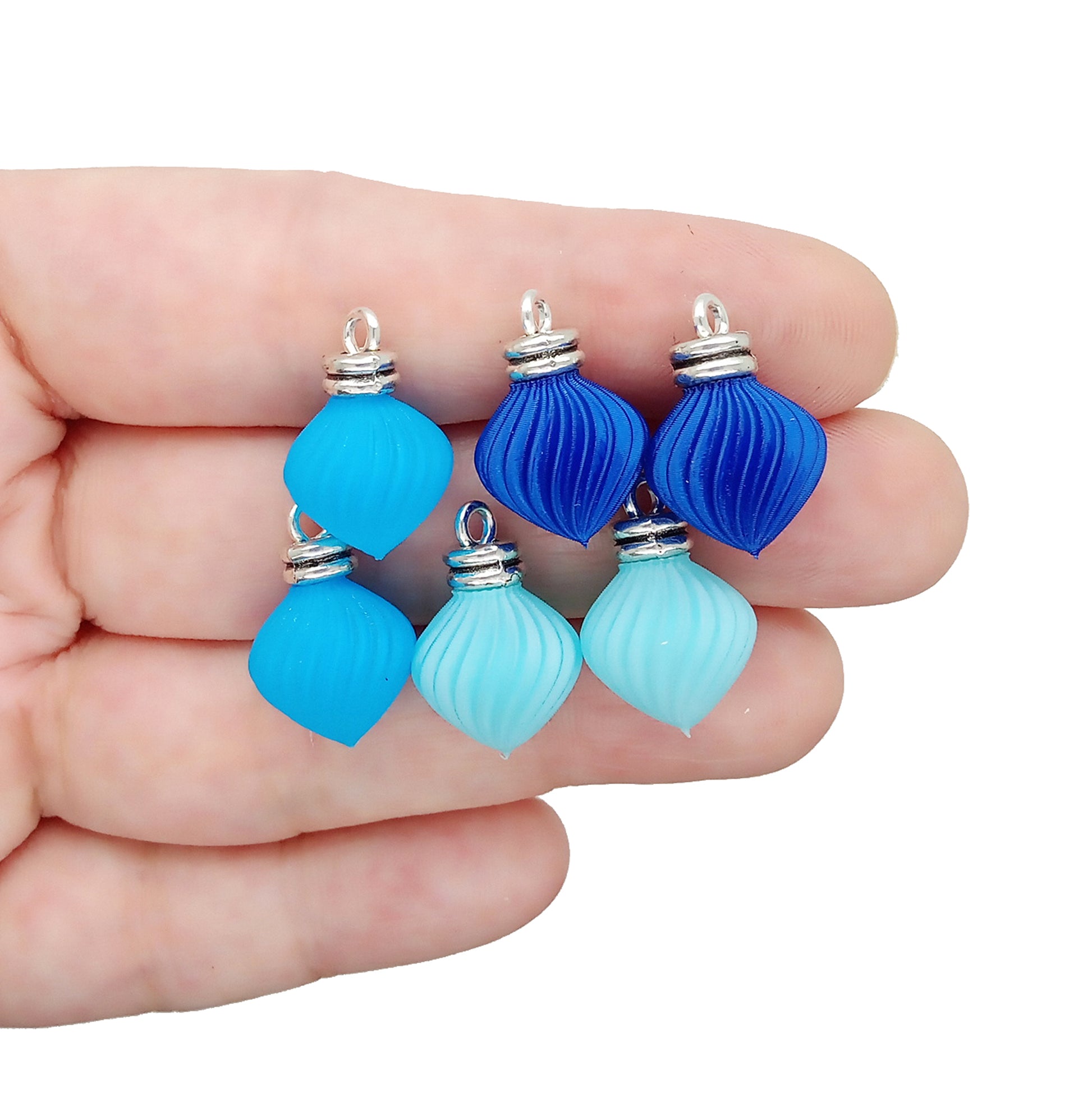 Blue miniature ornament charms for holiday jewelry and earrings.